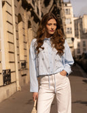 Blue striped shirt with embellishments